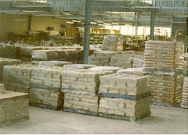 The packs are stacked on pallets ready for despatch.